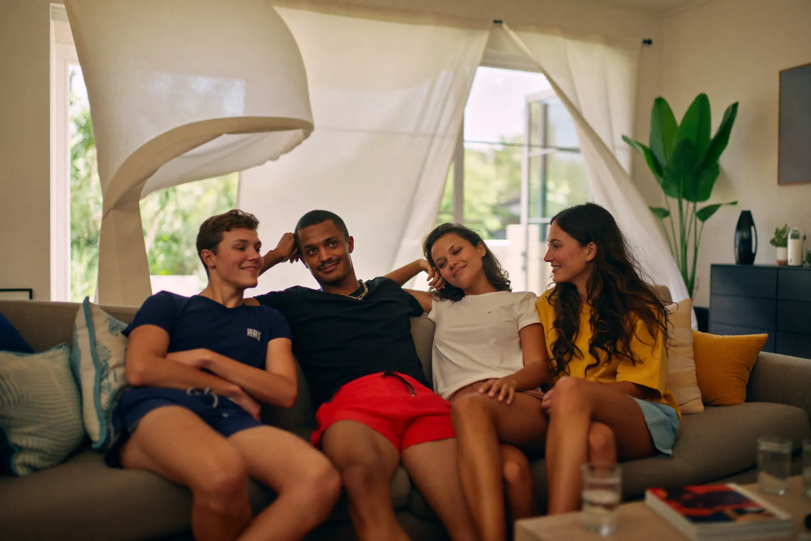 A family relaxing at home on a hot day